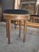 Golden wooden piano stool