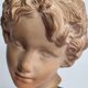 Bust of Bacchus child in patinated terracotta, 21 cm