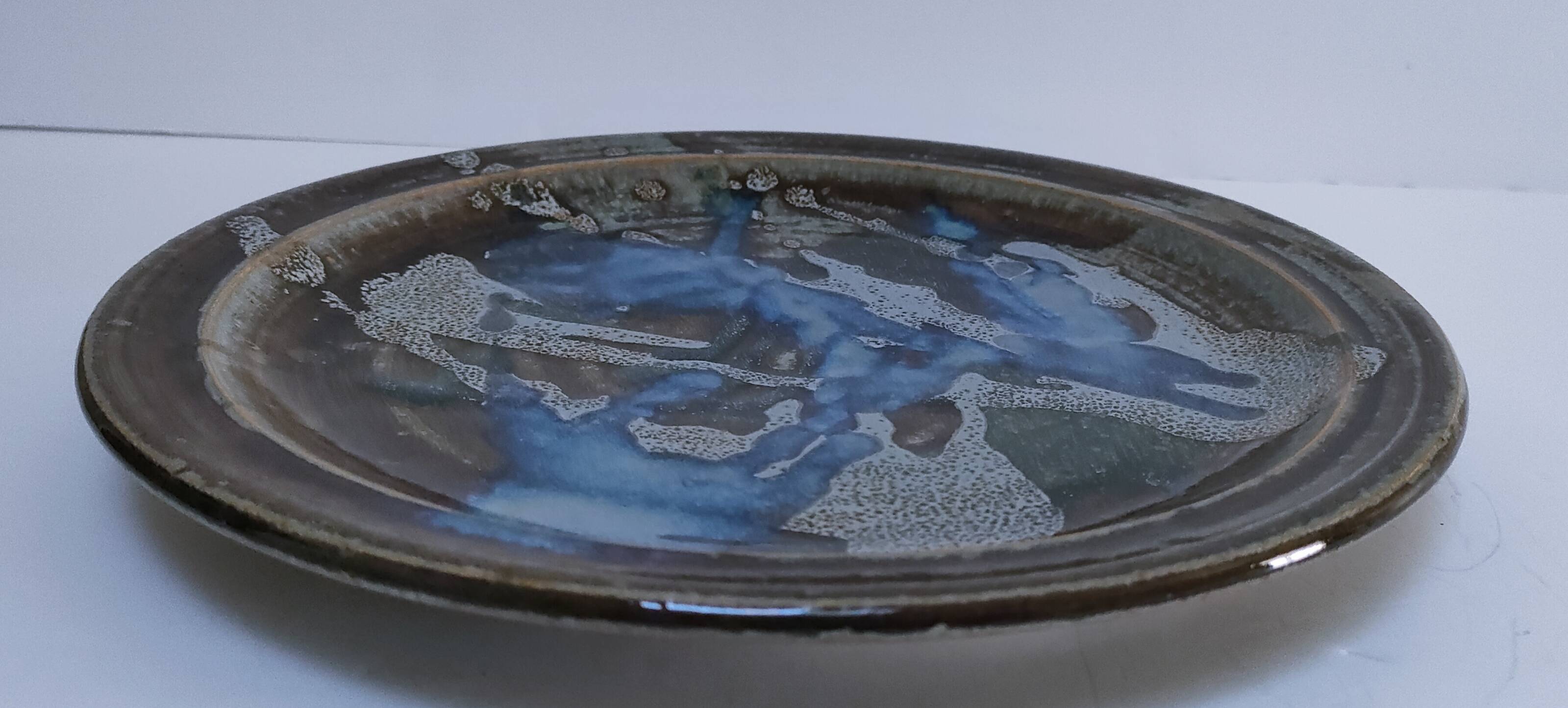 large enamelled stoneware plate signed mcb la borne