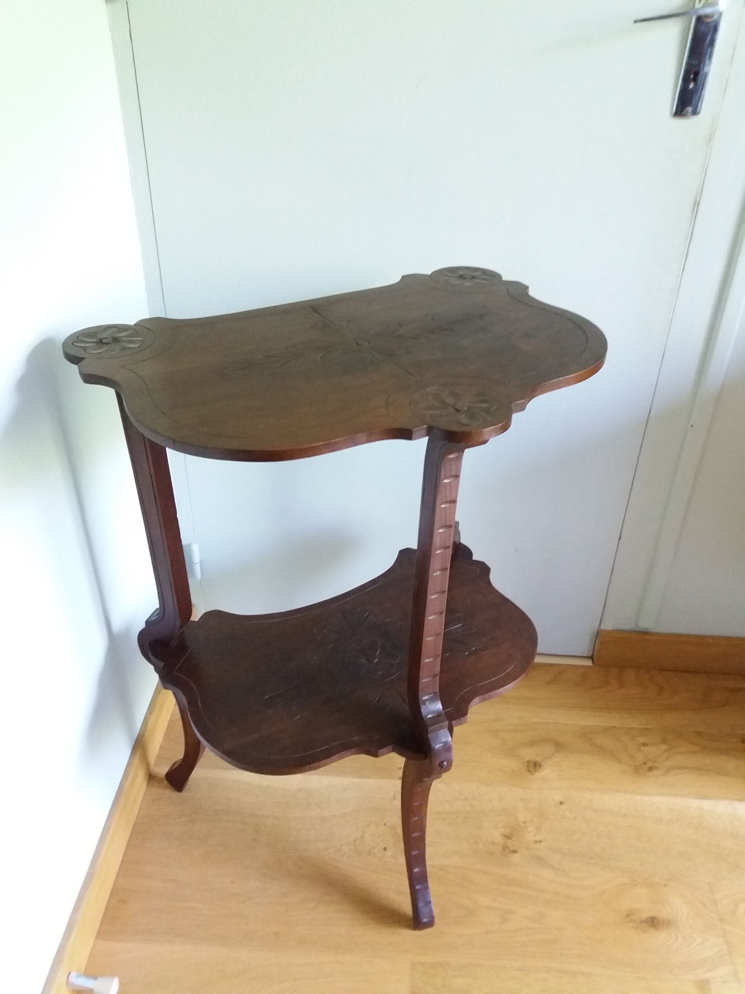 Triplet console harness in carved wood