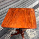 19th-century solid mahogany table with a tilting top and brass mechanism.