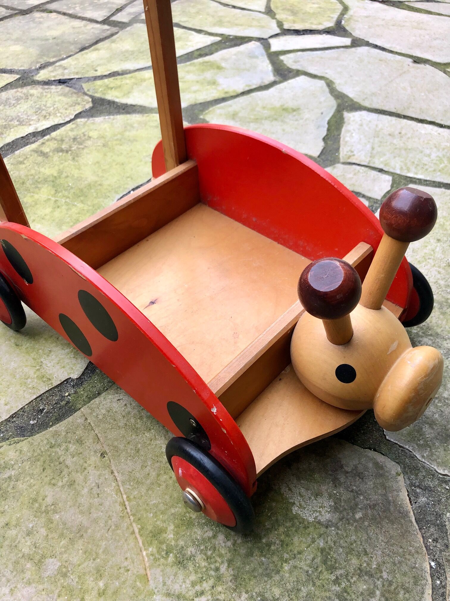 Antique toy with wheels child