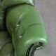 Large Chesterfield office armchair in green cowhide, in English style, on wheels.