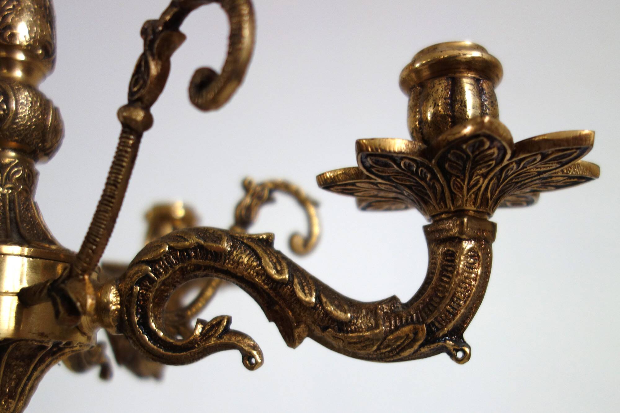 Pair of cherub candle holders in gilded bronze, early 20th century.