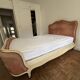 Elegant Louis XV style upholstered bed, patinated wood, house spirit of f