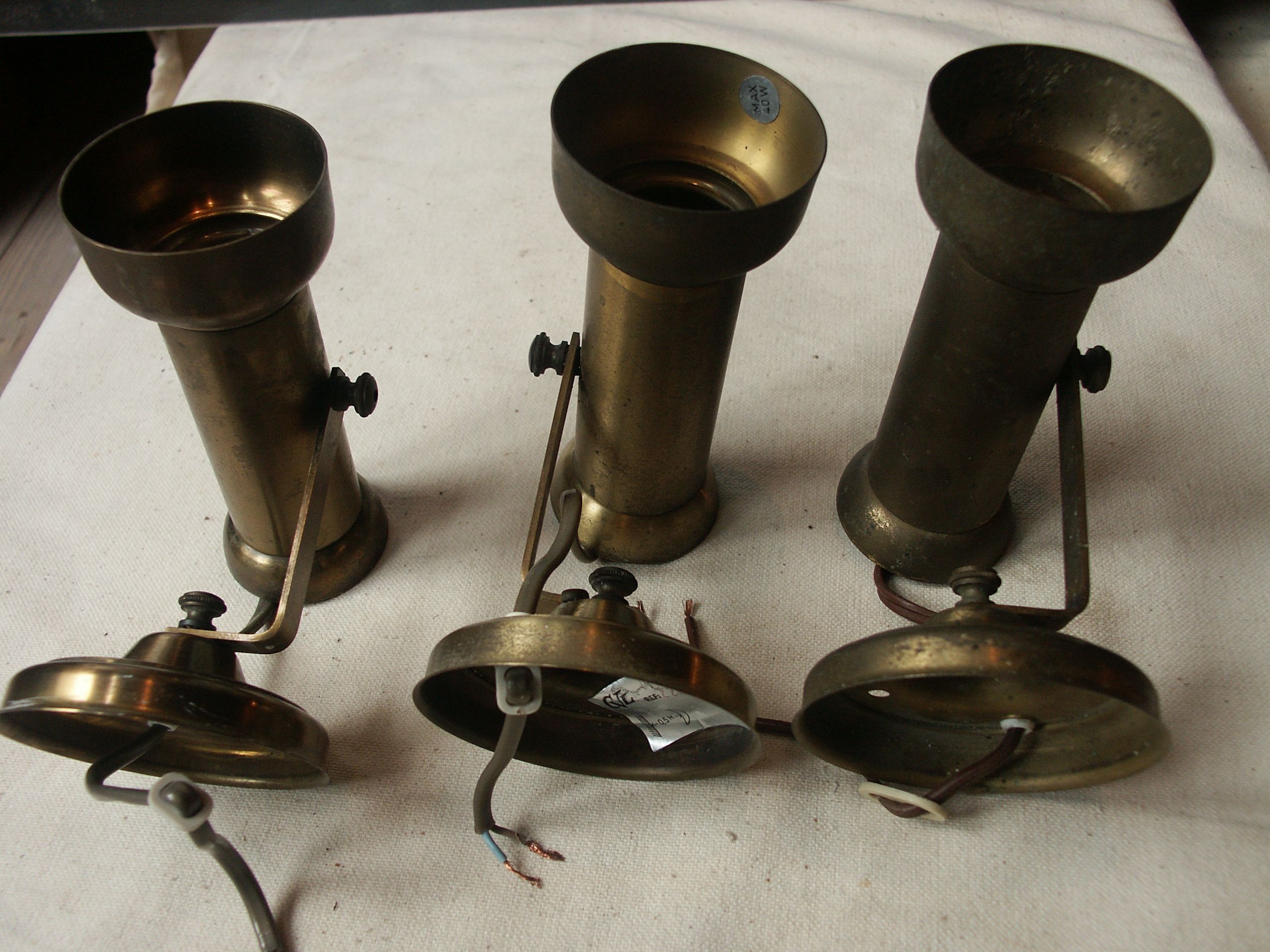 Trio of brass spots year 70
