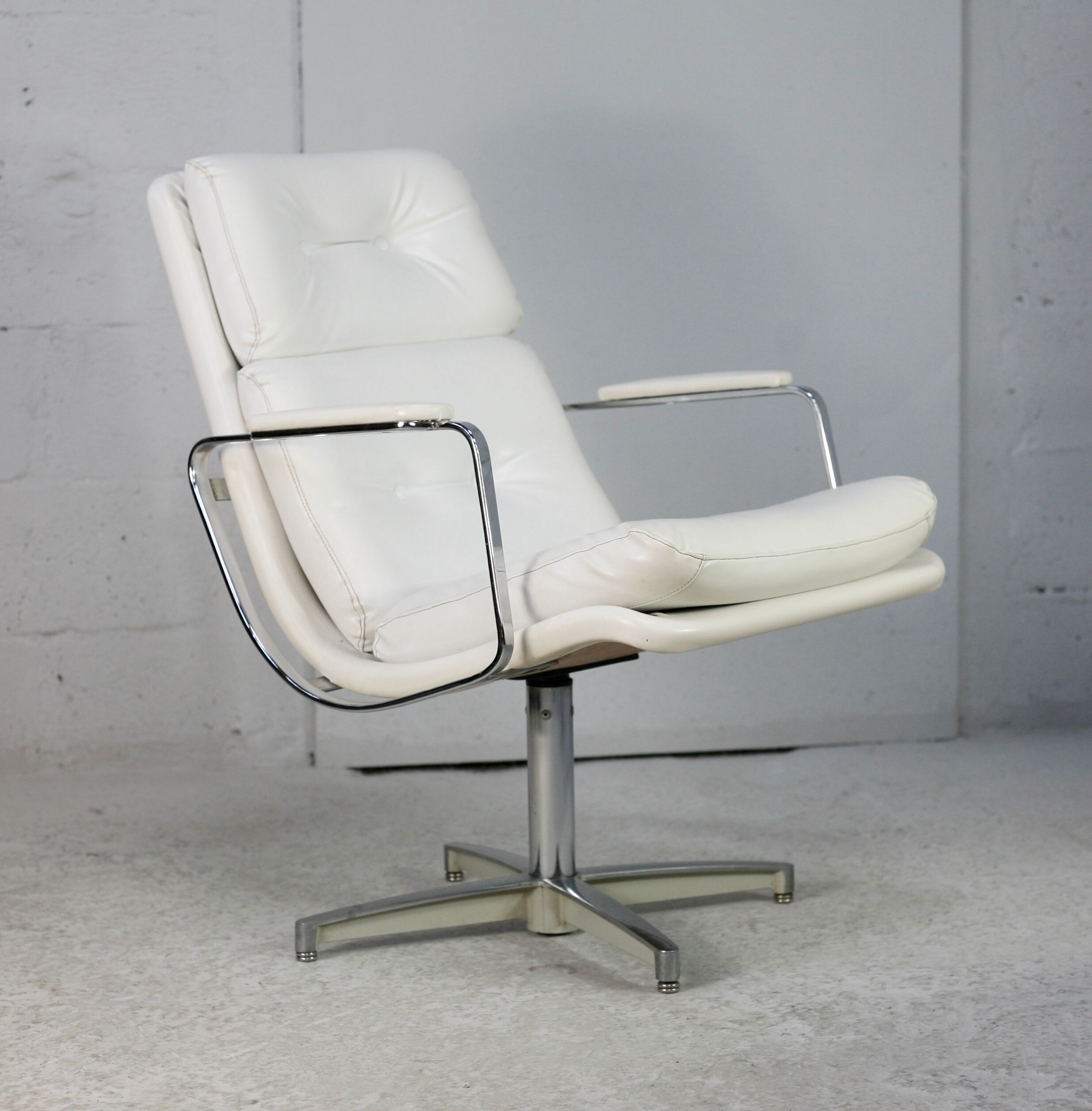 Armchair "Space Age"". Steel and imitation leather. Swivel. France, 70s