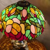 Antique bronze lamp and Tiffany-style stained glass shade. 46x32