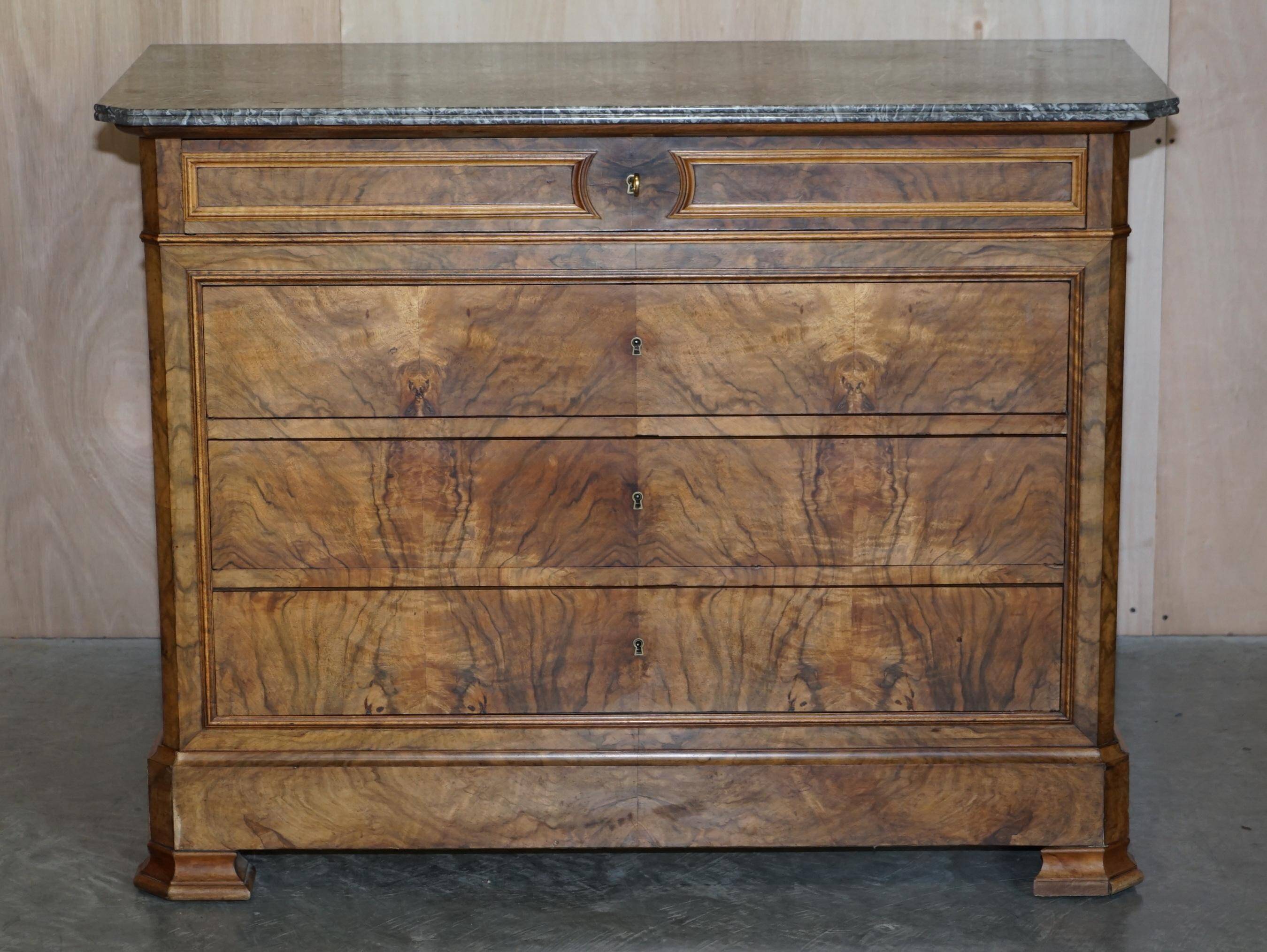 Antique walnut commode from 1860 with a marble top and original key.