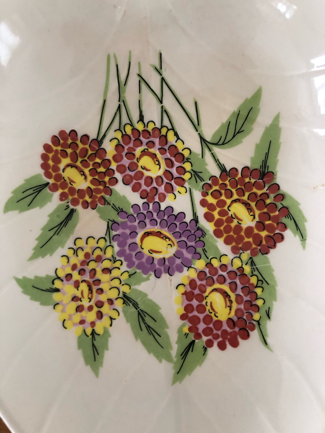 Vide poche en forme de feuille décor floral