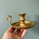 Lot de 2 bougeoirs anciens en laiton
