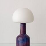 Mid-century modern table lamp by Jaap Ravelli, ceramic base and glass shade.