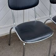 Pair of vintage faux leather and chrome chairs