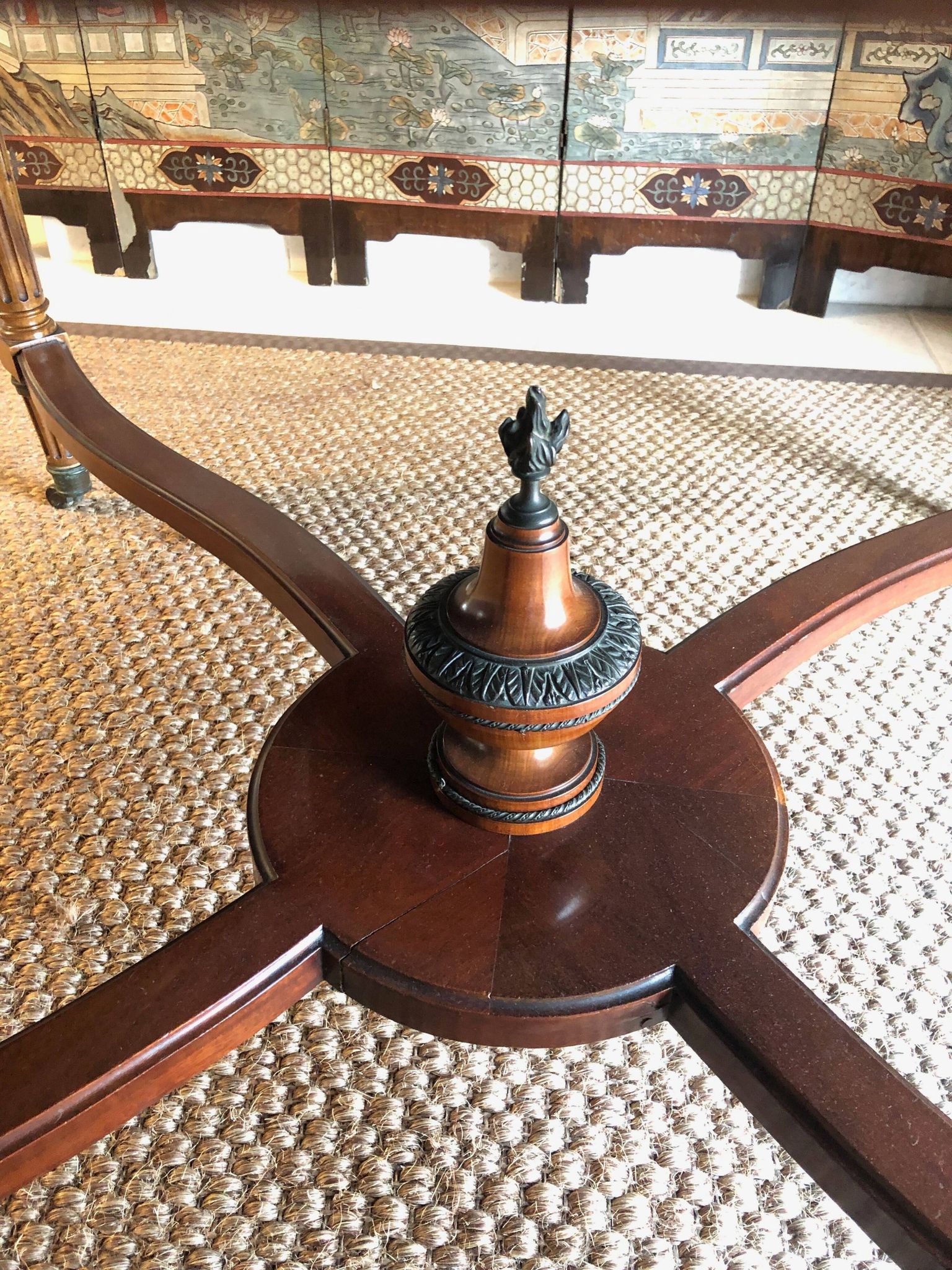 Important central pedestal table in mahogany, brass and bronze that can form a large dining table.