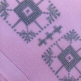 Large vintage linen tablecloth embroidered in pink and 12 matching napkins.