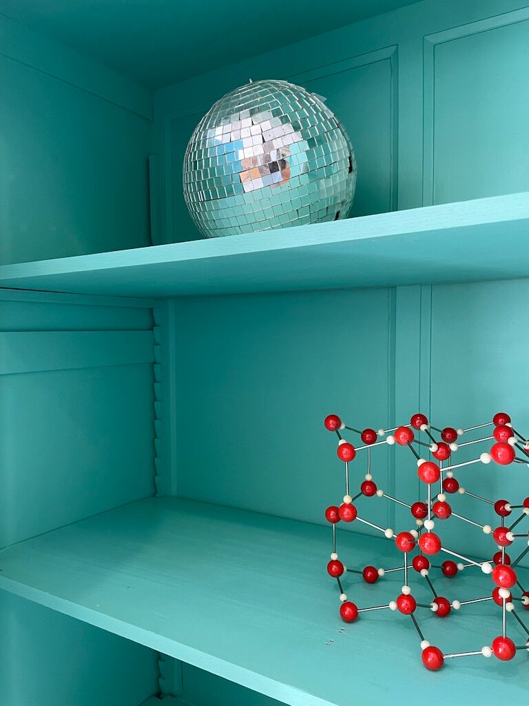 White and green cutter cabinet