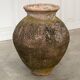 Old terracotta jar with its metal clasps, late 19th century.