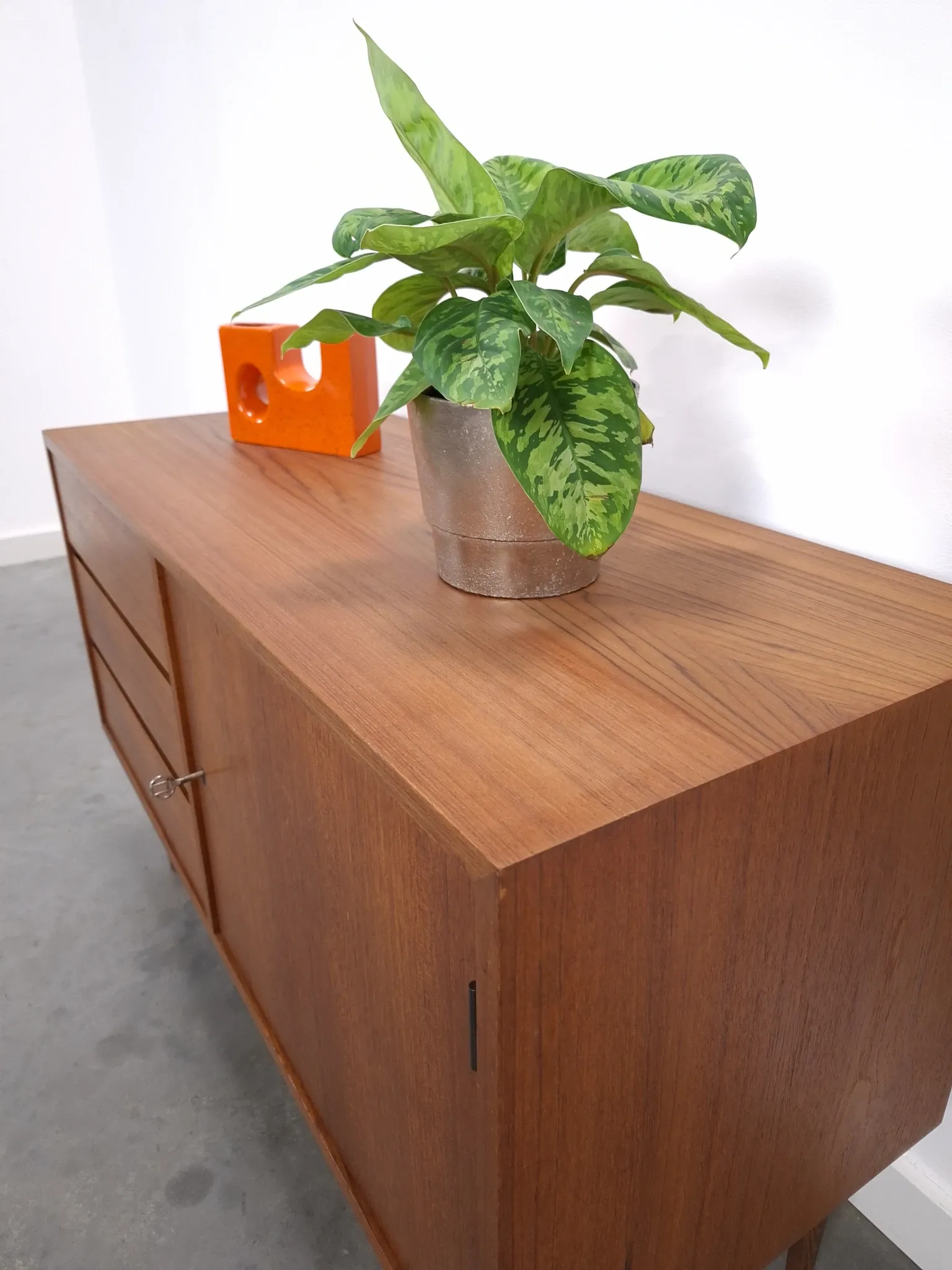 Vintage teak cabinet from the 1960s, sideboard with 3 drawers and a door.