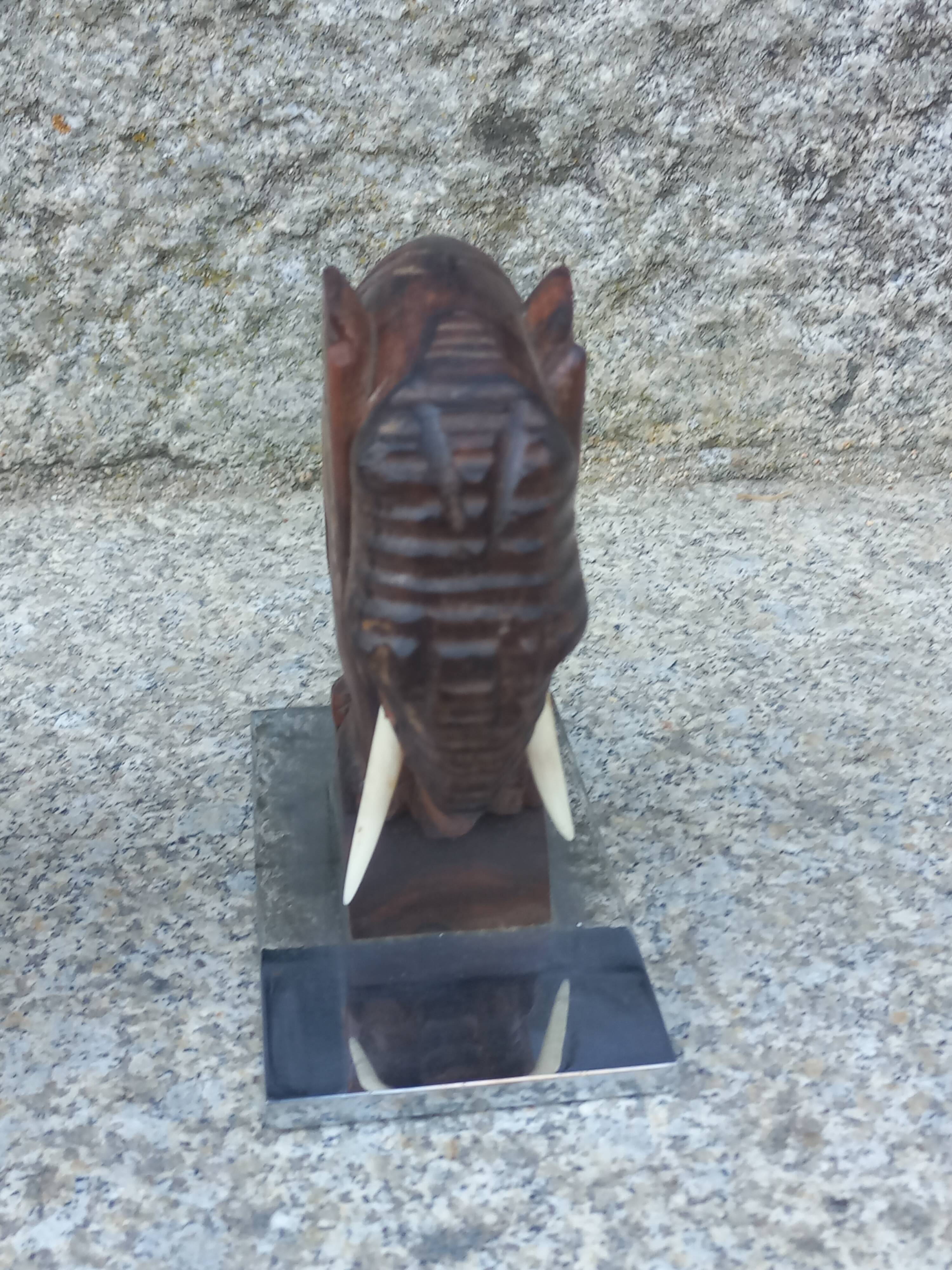 Pair of Art Deco elephant bookends in rosewood with chrome base.
