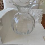 Glass ball vase with corolla