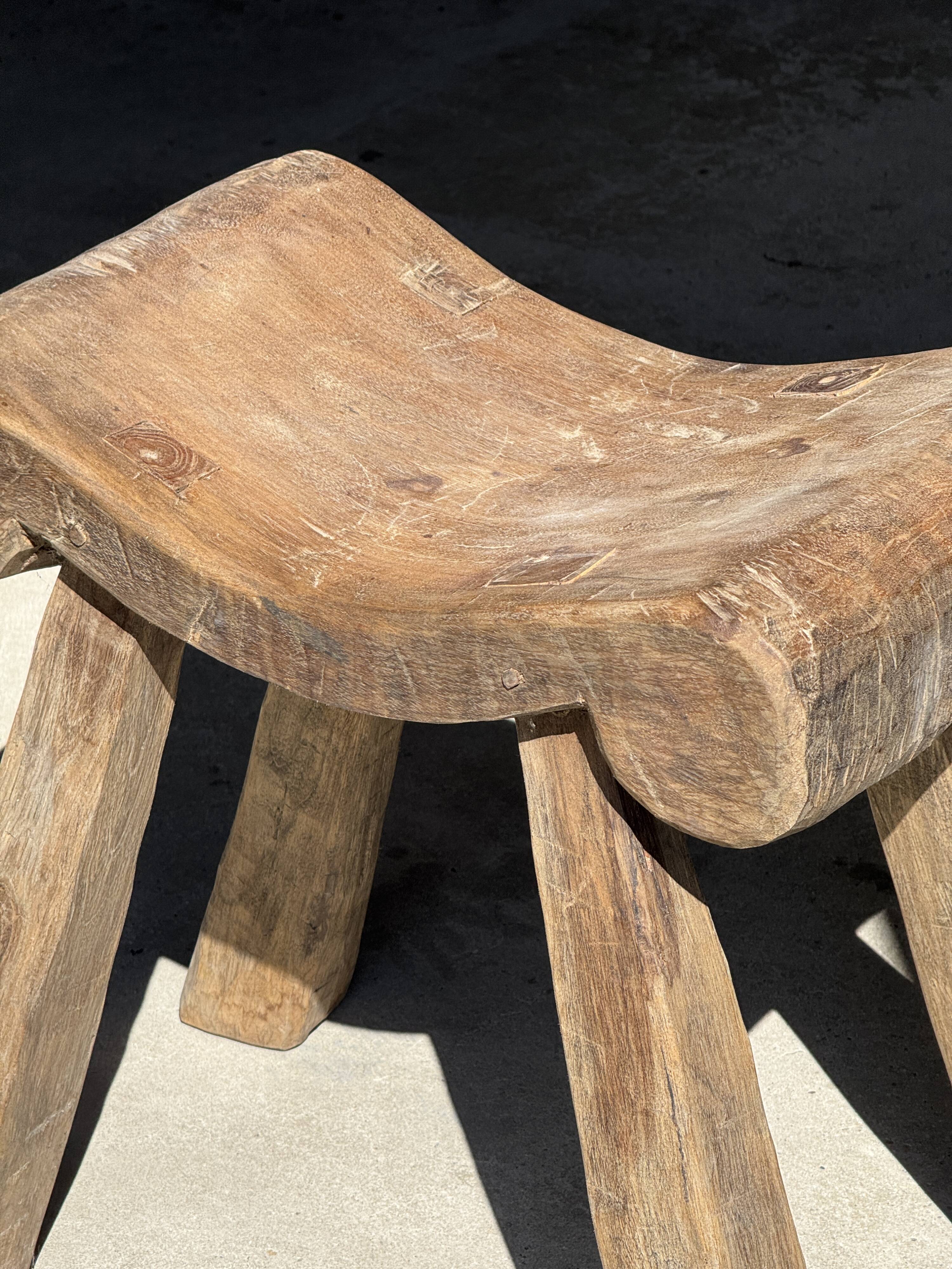 Four-legged stool in antique teak from Indonesia H 50 L 52