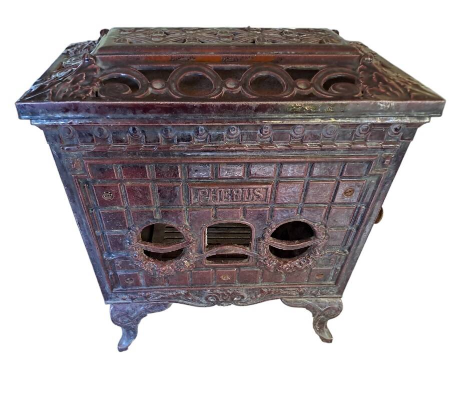 Antique enameled cast iron art deco wood stove, Phebus brand, aubergine color