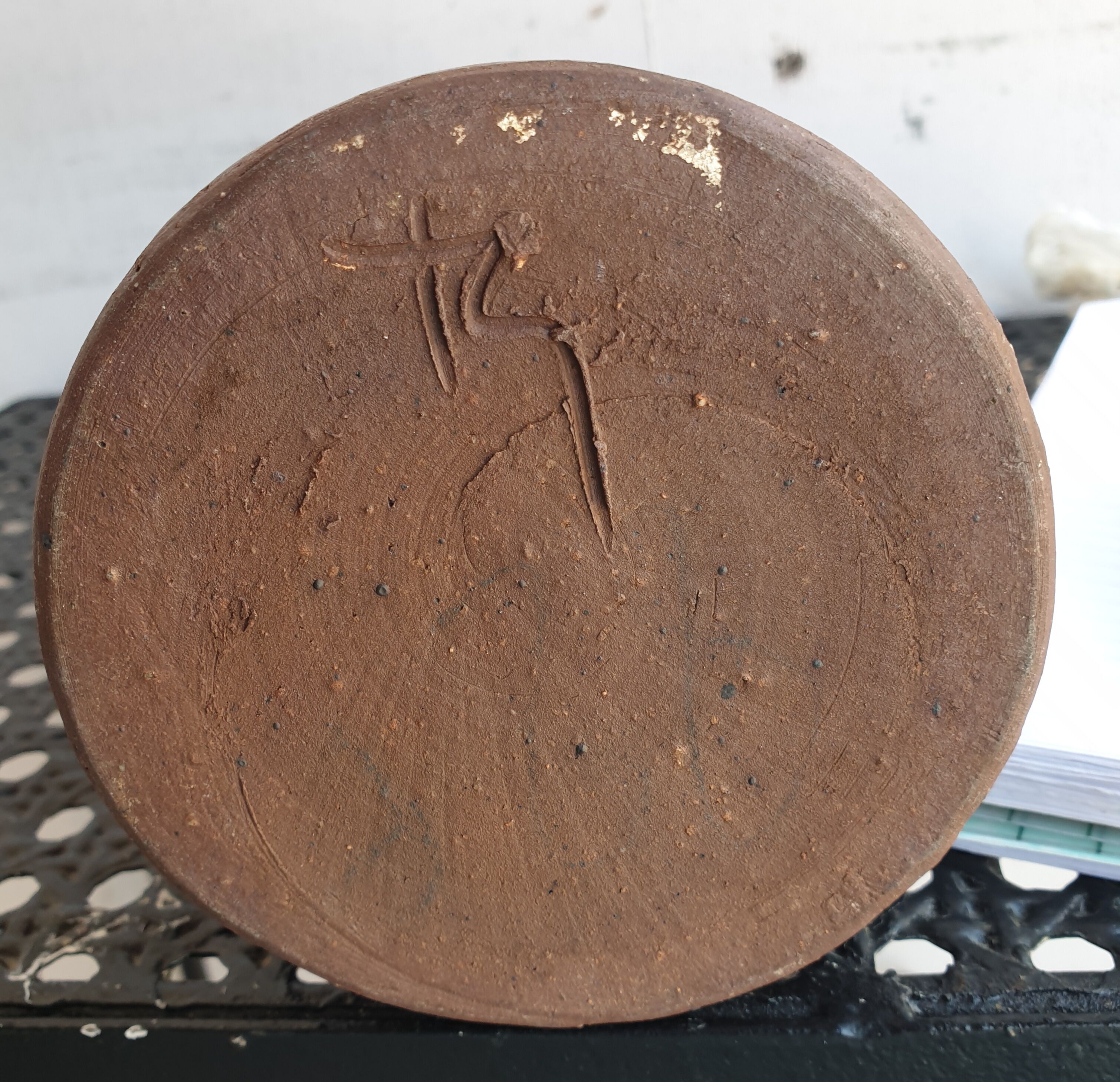 Old bottle in pyrity sandstone