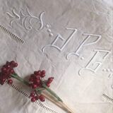 Mixed-race sheet with JPG monogram.