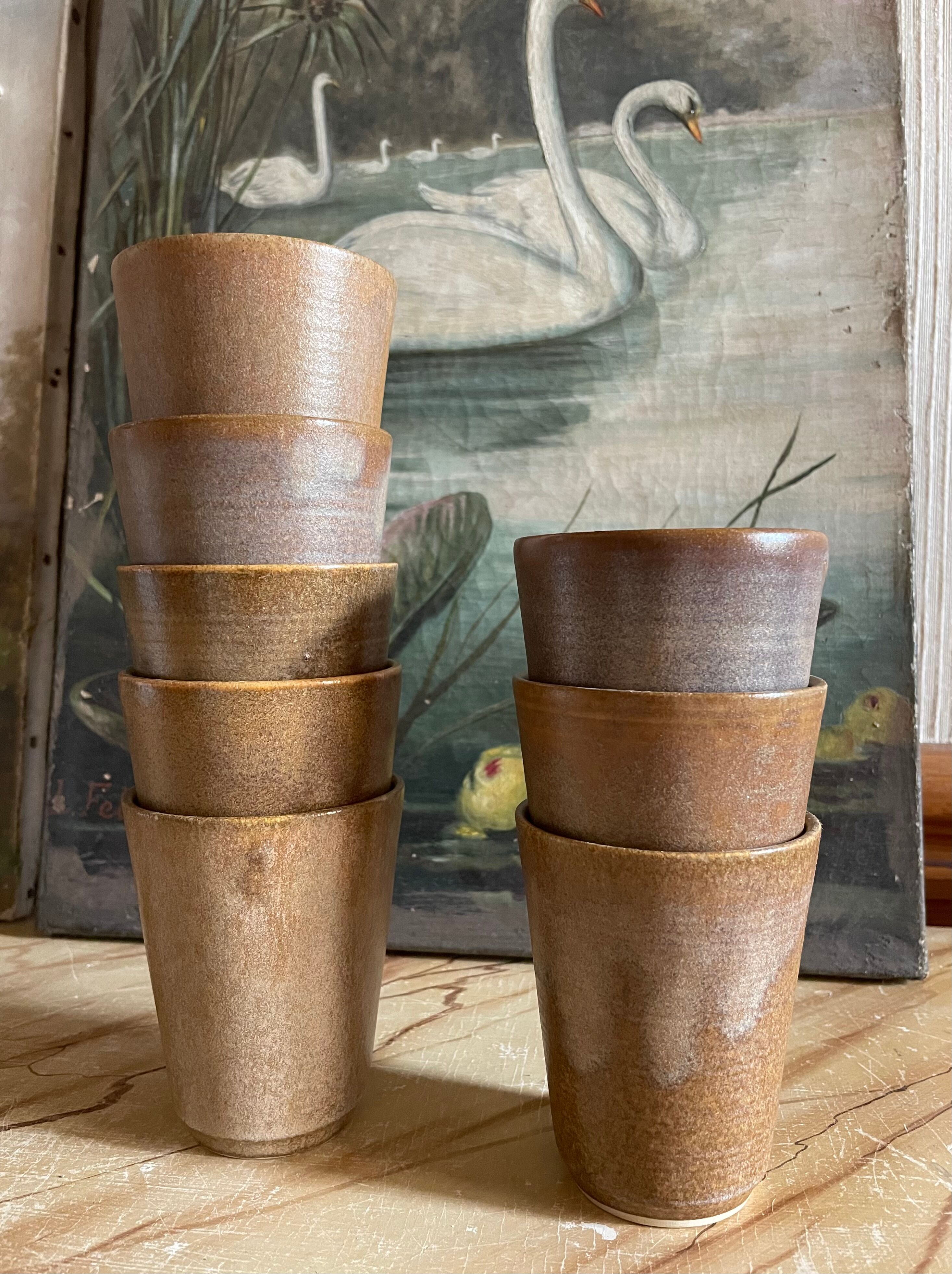 8 vintage stoneware glasses