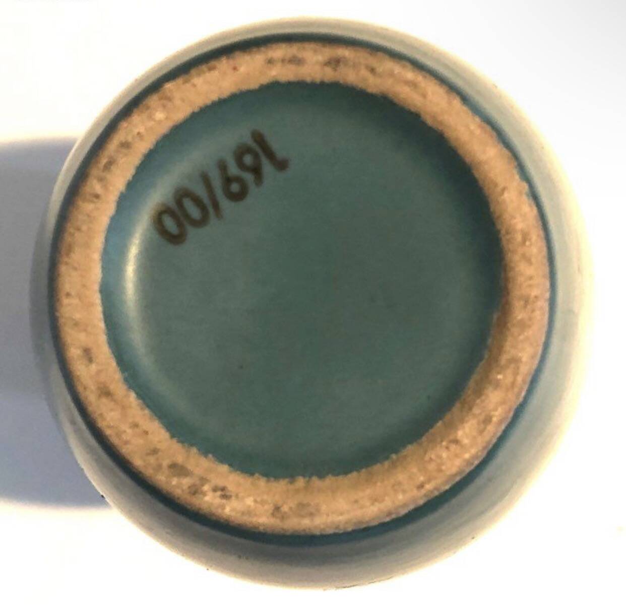 Turquoise ceramic vase