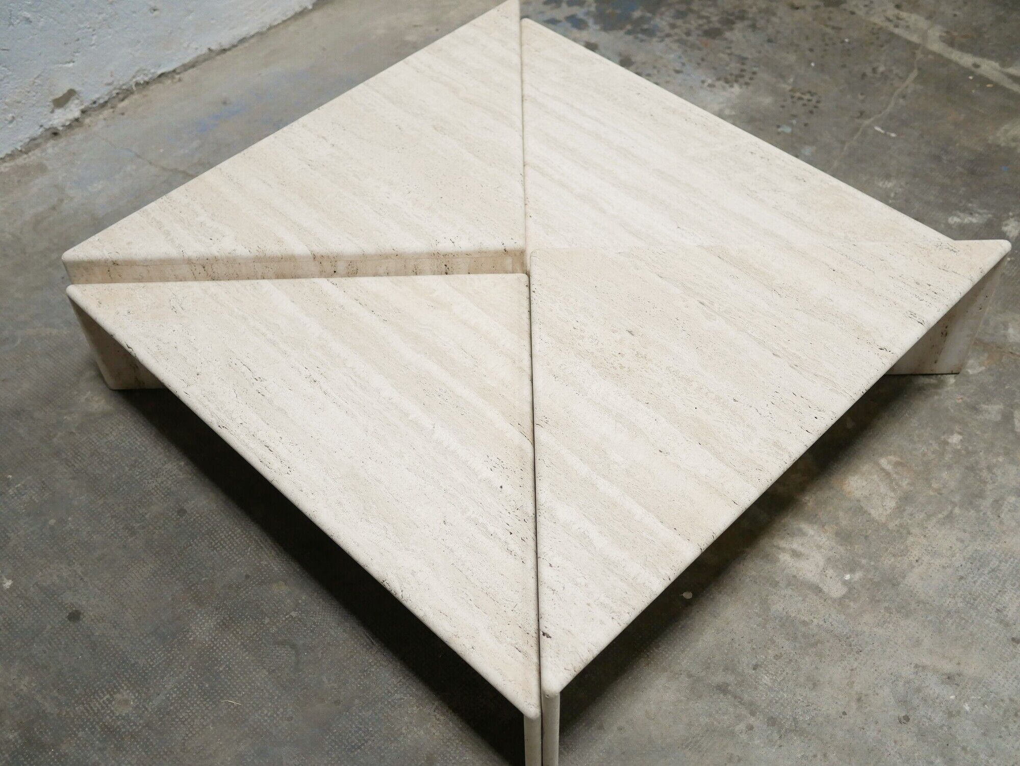 Series of 2 vintage travertine coffee tables published by Roche Bobois