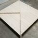 Series of 2 vintage travertine coffee tables published by Roche Bobois