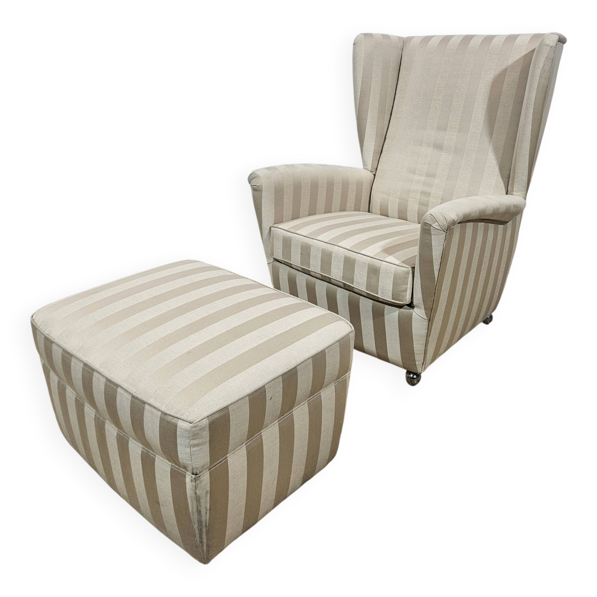 Winged armchair with footstool, 1960s.