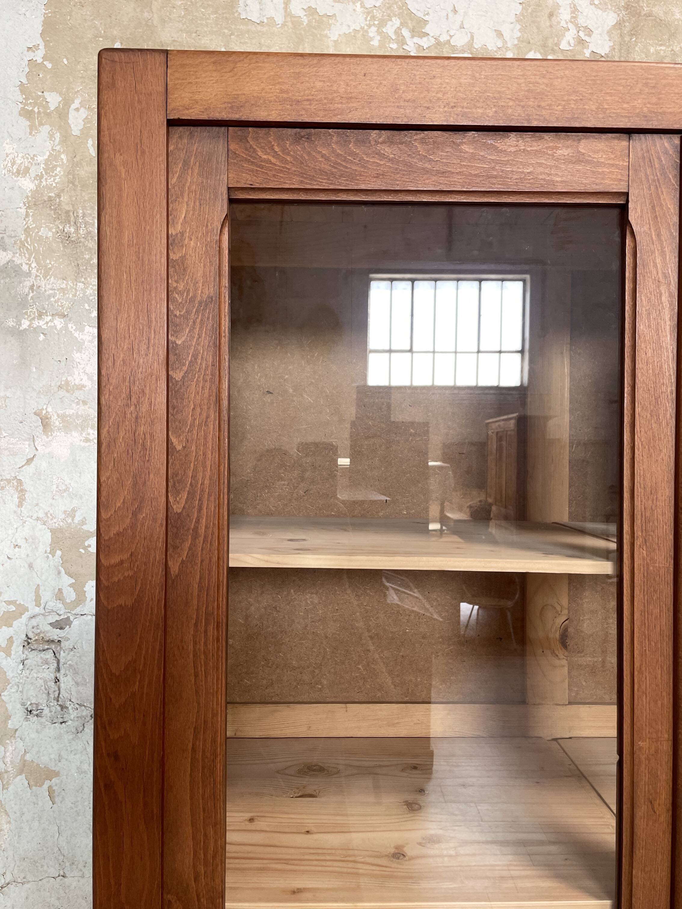 Solid wood display cabinet.