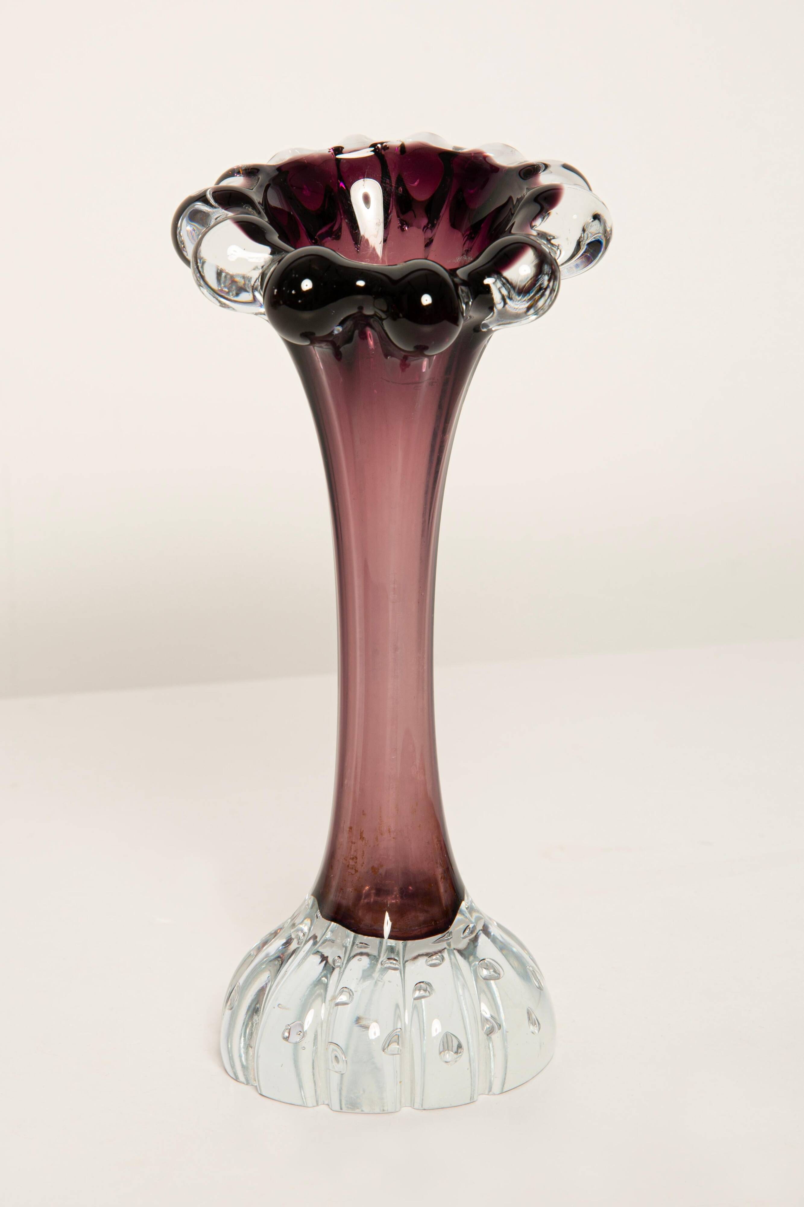 Thin small vintage purple glass vase from the mid-century, Europe, 1960s.