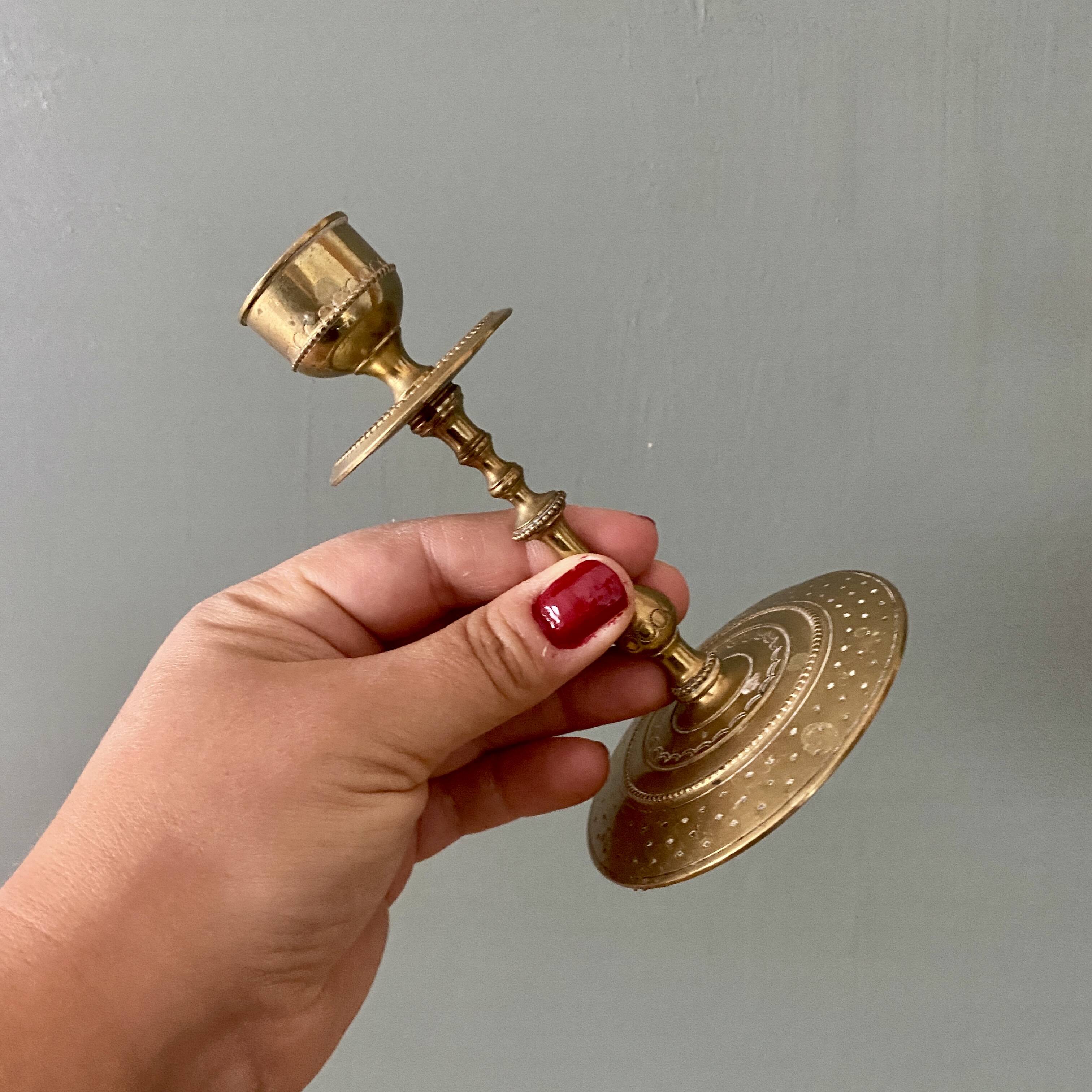 Antique brass candlestick holder