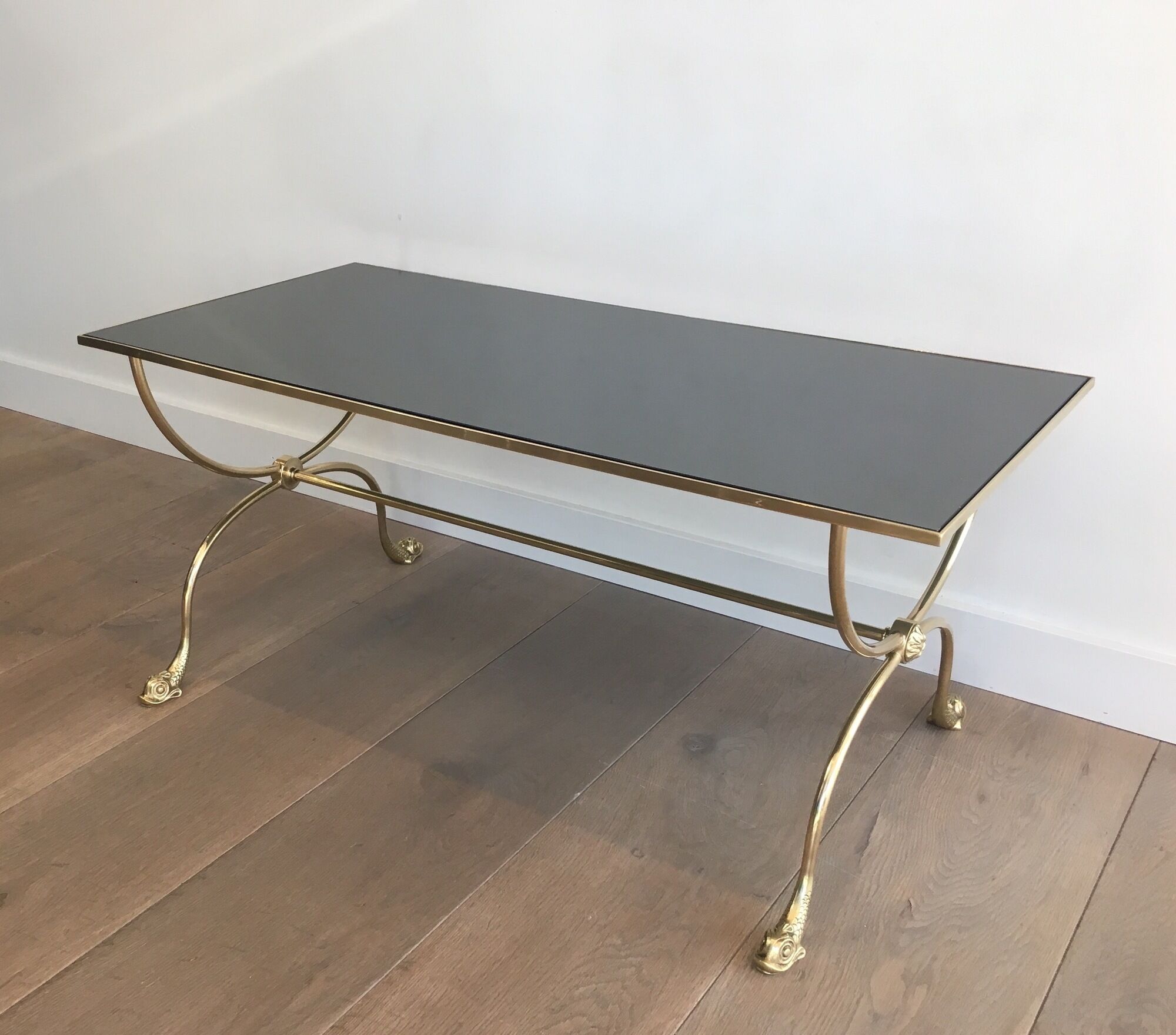 Neoclassical brass style coffee table with dolphin head decoration