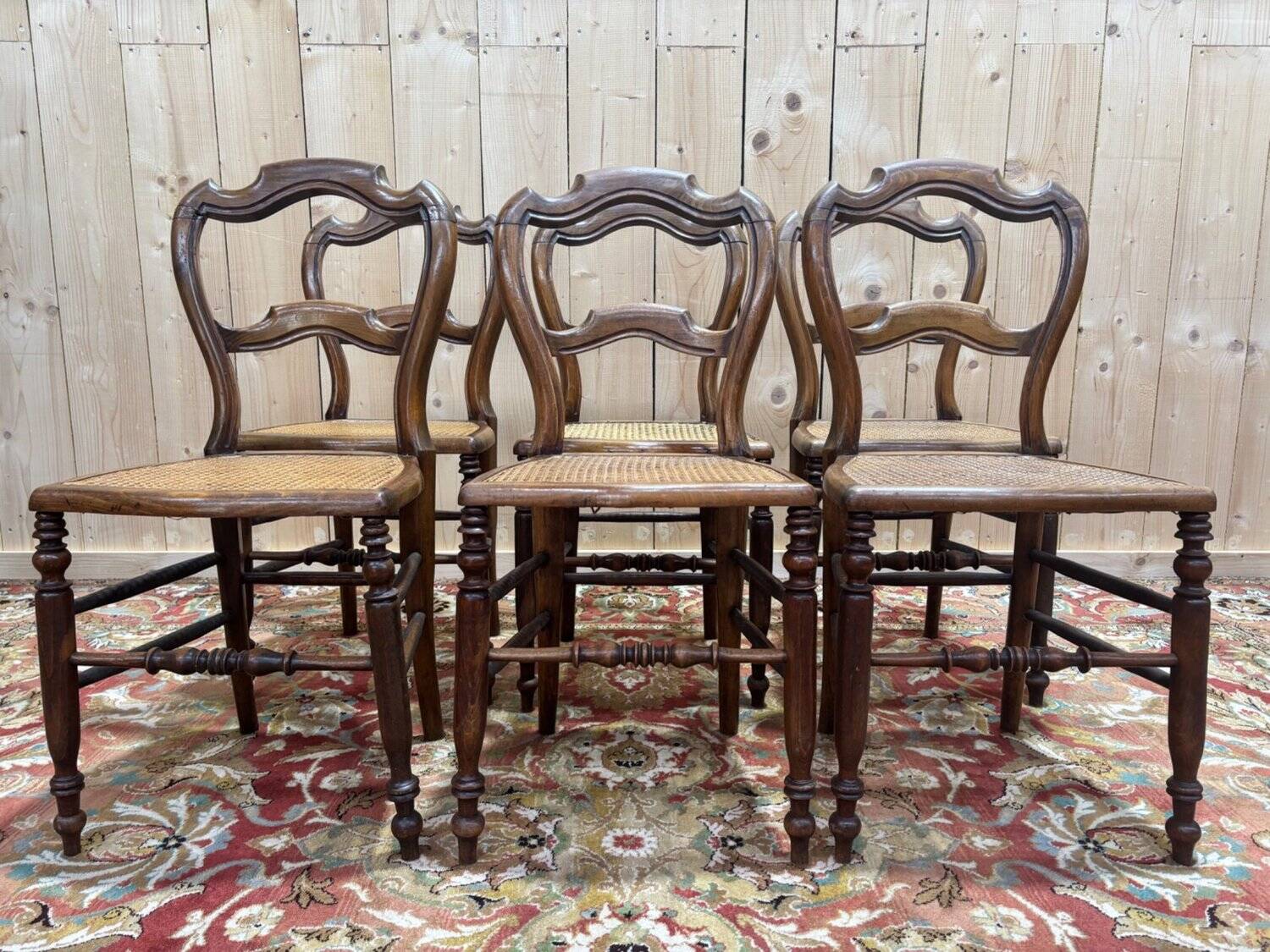 Set of 6 Louis-Philippe caned walnut chairs, 19th century.