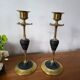 Pair of brass and black hard stone candlesticks