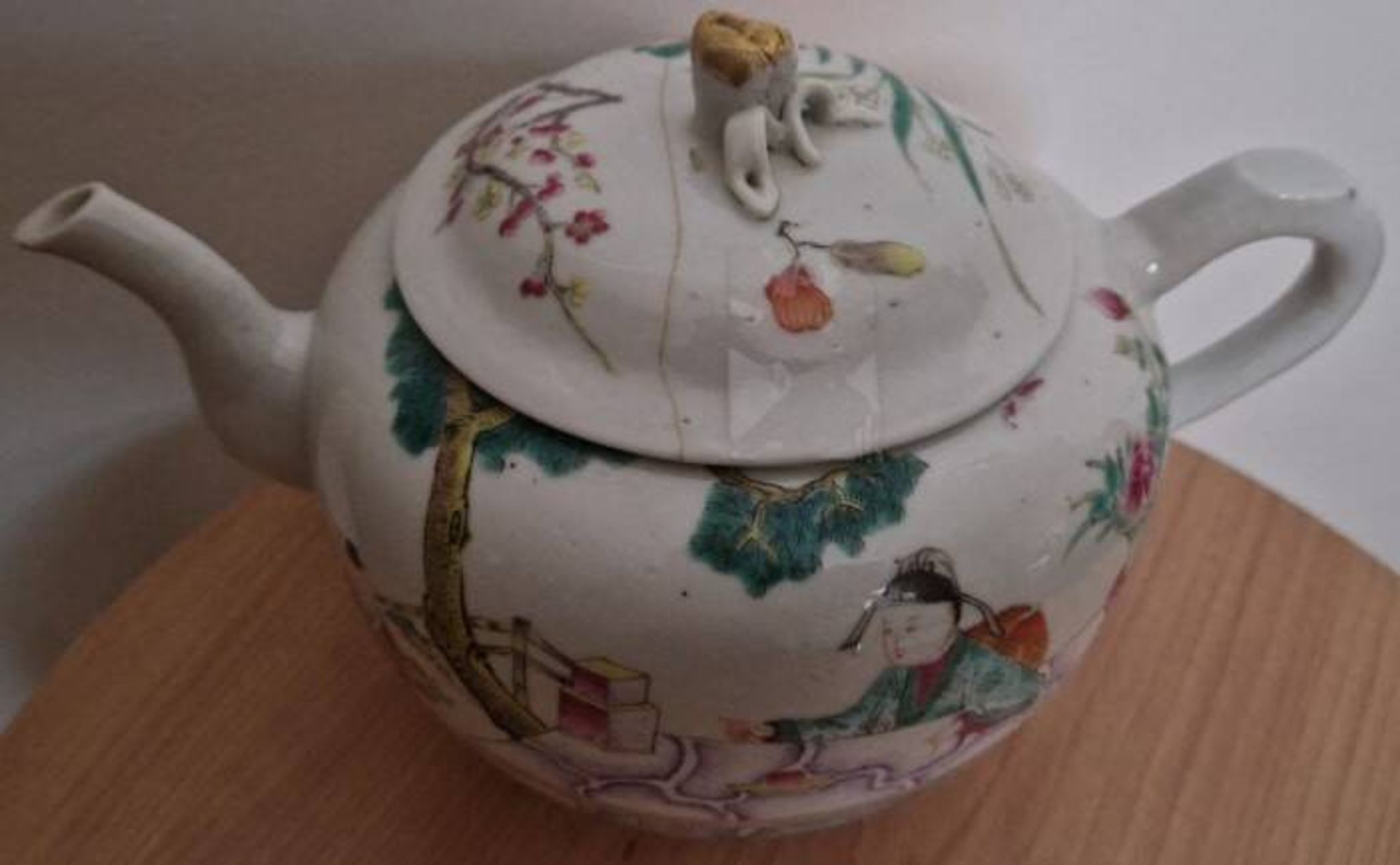 Antique Chinese enameled porcelain teapot with famille rose decoration