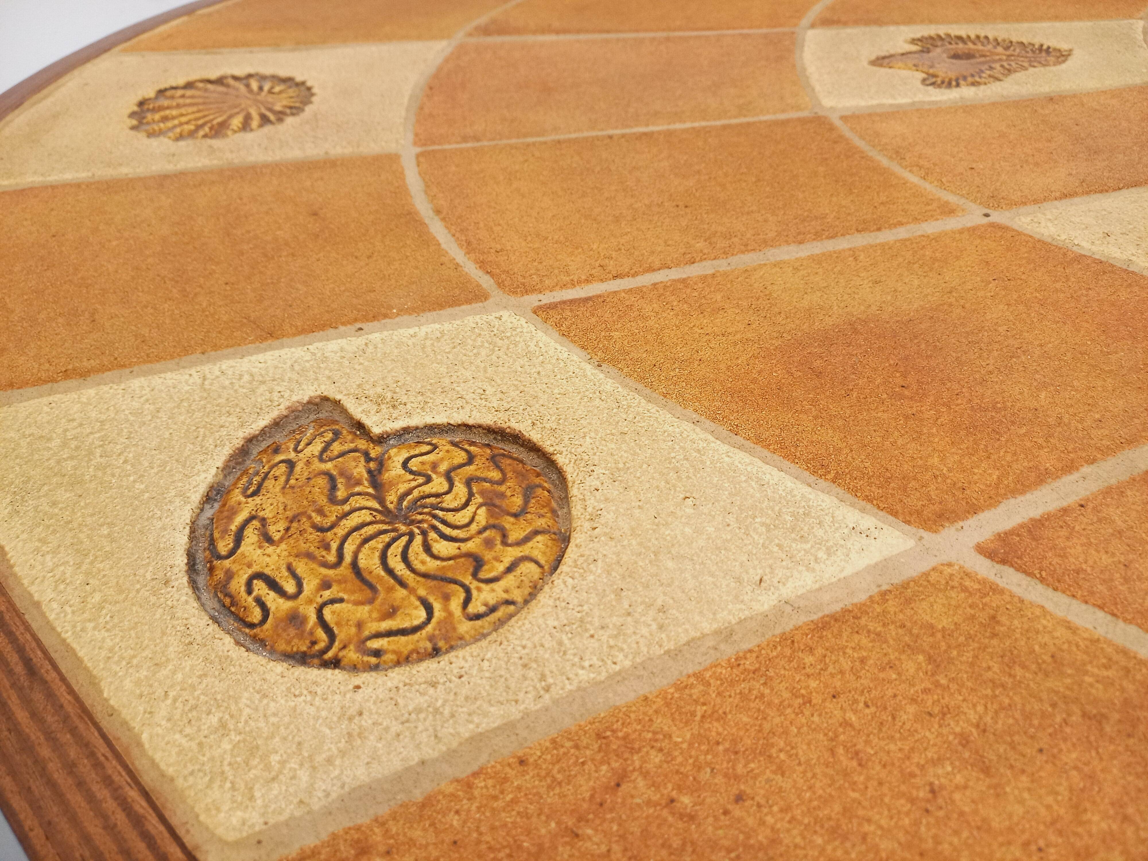 Barrois vintage shell-patterned comma coffee table in wood and ceramic.