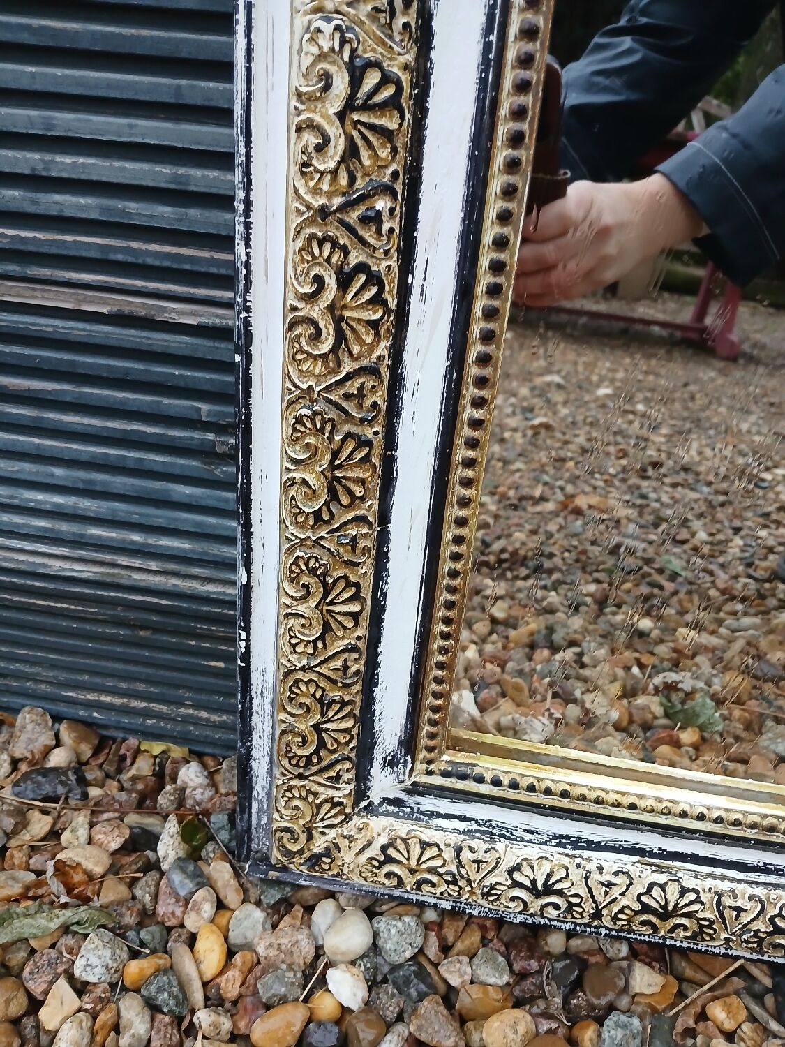 Antique mirror with carved wooden frame