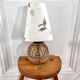 Lampe boule rotin et herbier