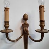 Pair of Louis XVI style bronze wall lights