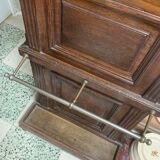 Old wall-mounted mantle-holder cloakroom in see