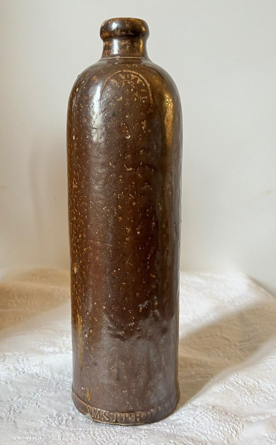 Vintage glazed stoneware bottle Amsterdam