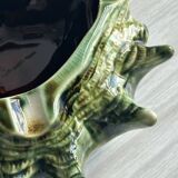 Green shell-shaped ashtray.