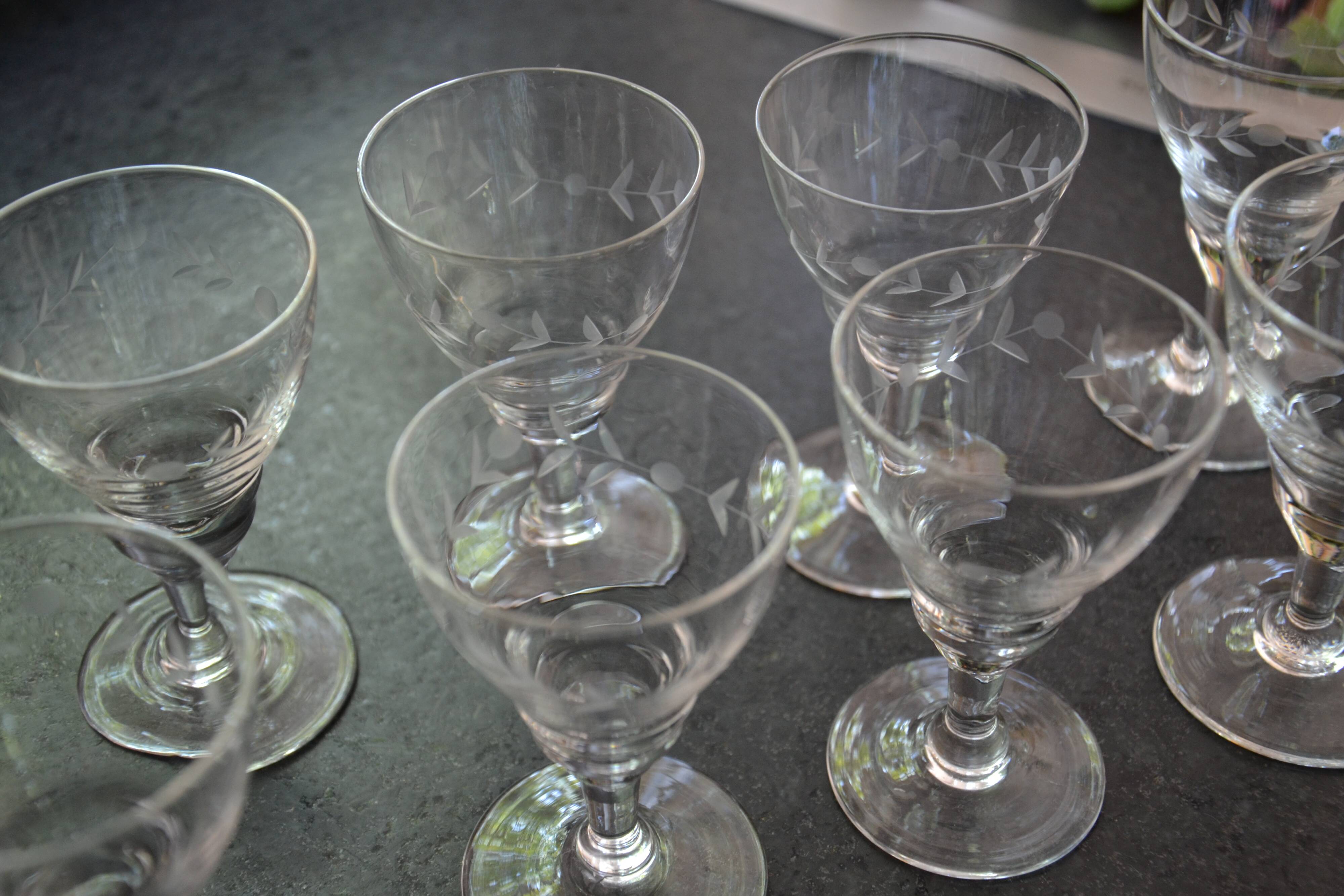 8 small old chiseled glasses