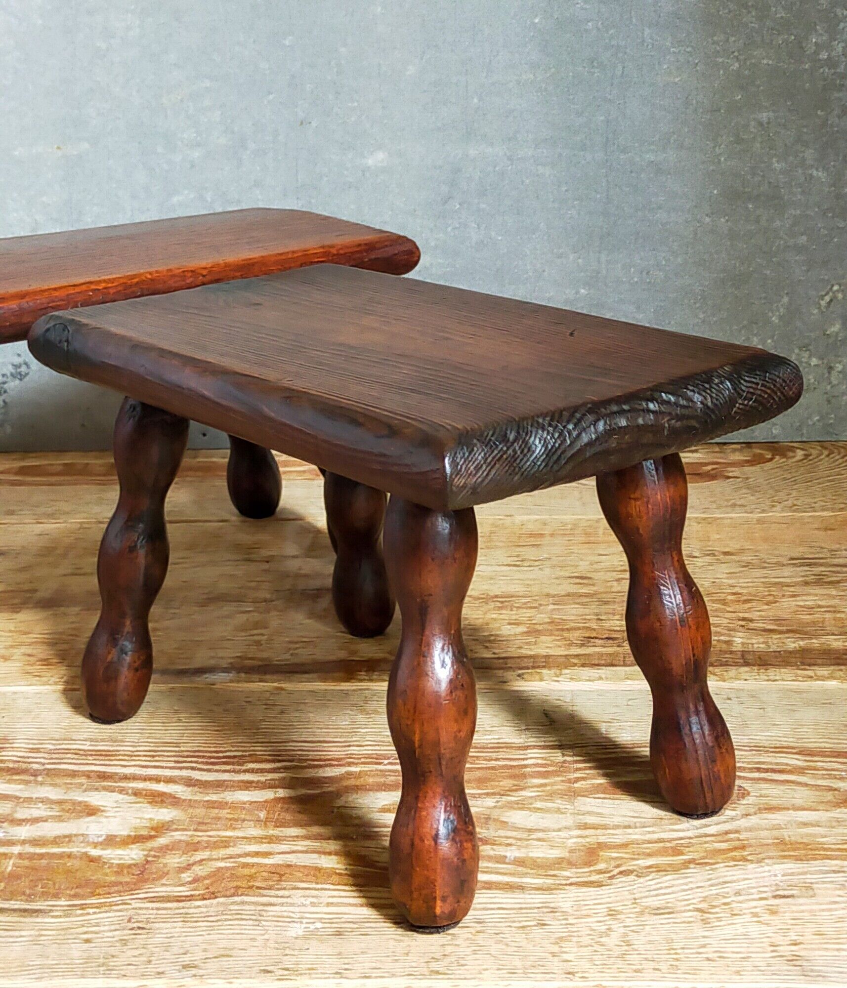 Pair of vintage solid turned wood footstools