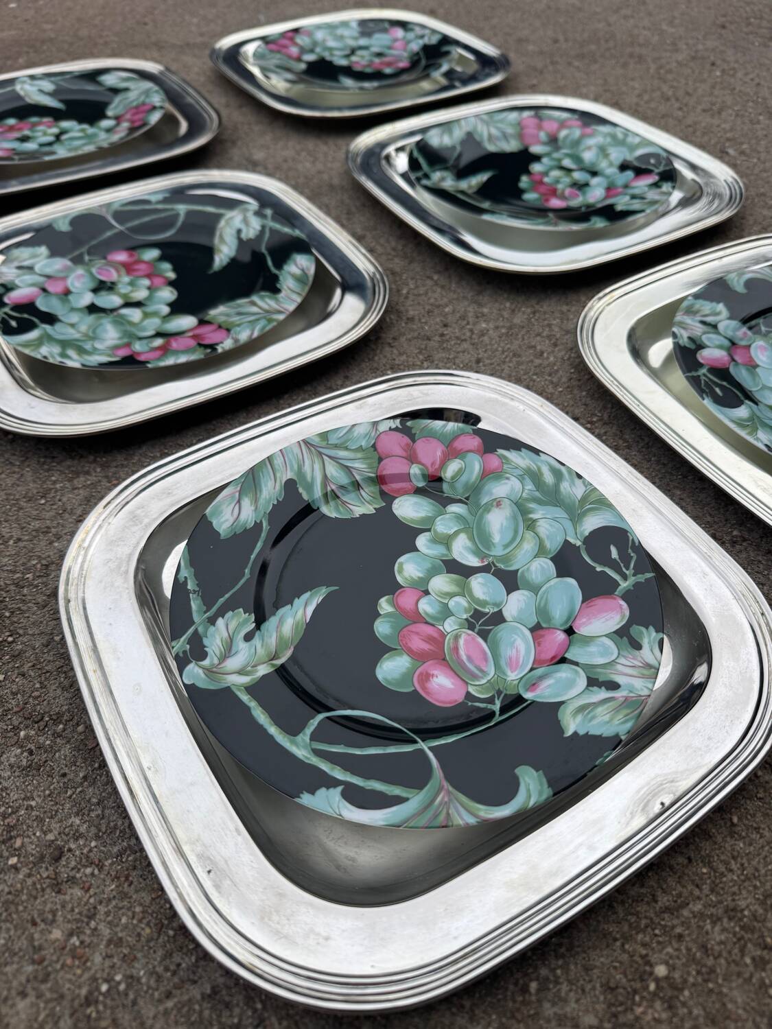 Silver-plated metal underplates from the 1980s.